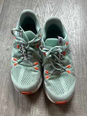 On Running Women's Mint Green Athletic Shoes with Orange Accents